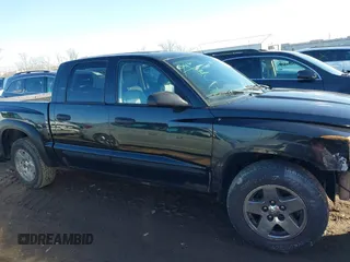 2006 Dodge Dakota SLT z VIN 1D7HW48K66S632826, wystawiony jako IAAI lot #41635407 z przebiegiem 208 046 mil mil oraz . Historia ofert i sprzedaży dostępna na DreamBid. Obrazek 14.