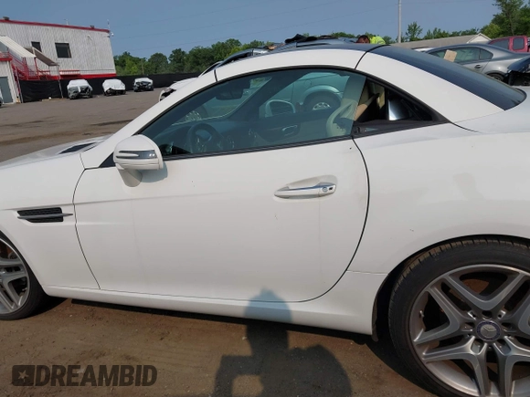 2015 Mercedes-Benz SLK 250 z VIN WDDPK4HA2FF100514, wystawiony jako IAAI lot #42414167 z przebiegiem 120 615 mil mil oraz . Historia ofert i sprzedaży dostępna na DreamBid. Obrazek 14.