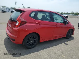 2018 Honda Fit Sport z VIN 3HGGK5H67JM705280, wystawiony jako Copart lot #59912425 z przebiegiem 193 253 mil mil oraz Czysty tytuł • Clean title. Historia ofert i sprzedaży dostępna na DreamBid. Obrazek 3.