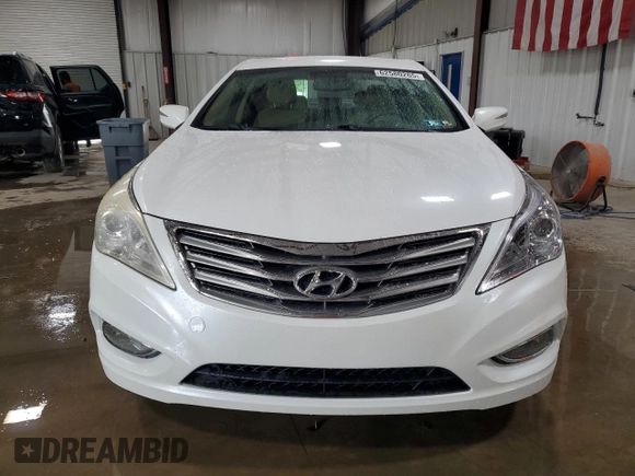 2013 Hyundai Azera z VIN KMHFG4JG7DA229084, wystawiony jako Copart lot #62580265 z przebiegiem 114 505 mil mil oraz Szkoda całkowita • Salvage title. Historia ofert i sprzedaży dostępna na DreamBid. Obrazek 5.