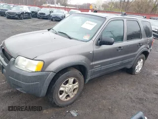 2002 Ford Escape XLT Choice with VIN 1FMYU04122KC36937, listed as a IAAI auction lot 42014887 with 141,885 mi miles. Bid and sale history available at carsss.com. Image 2.