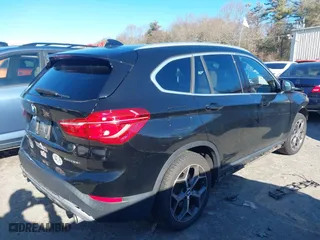 2019 BMW X1 xDrive28i with VIN WBXHT3C50K5L35416, listed as a IAAI auction lot 41195144 with 75,643 mi miles. Bid and sale history available at carsss.com. Image 4.