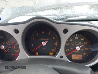 2004 Nissan 350Z Touring z VIN JN1AZ36A14M253275, wystawiony jako IAAI lot #42181345 z przebiegiem 63 886 mil mil oraz . Historia ofert i sprzedaży dostępna na DreamBid. Obrazek 7.