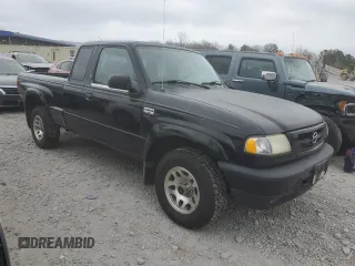 2001 Mazda B-Series 2WD Truck DS with VIN 4F4YR16U91TM20842, listed as a Copart auction lot 86658474 with 113,039 mi miles and Clean Title. Bid and sale history available at carsss.com. Image 4.