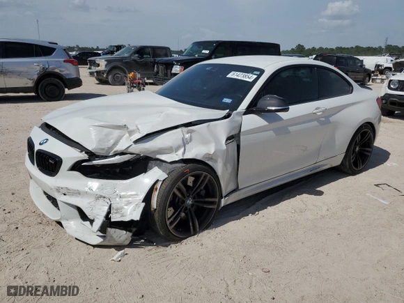 2018 BMW M2 with VIN WBS1J5C51JVD36522, listed as a Copart auction lot 61423854 with 57,933 mi miles and Salvage Title. Bid and sale history available at carsss.com. Image 1.