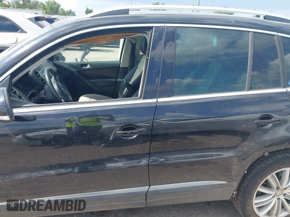 2016 Volkswagen Tiguan R-Line with VIN WVGAV7AX4GW602817, listed as a IAAI auction lot 42460344 with 124,612 mi miles and . Bid and sale history available at DreamBid. Image 14.