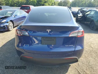 2024 Tesla Model Y Long Range with VIN 7SAYGDEE4RF032154, listed as a Copart auction lot 61973635 with 10,022 mi miles and Salvage title. Bid and sale history available at DreamBid. Image 6.