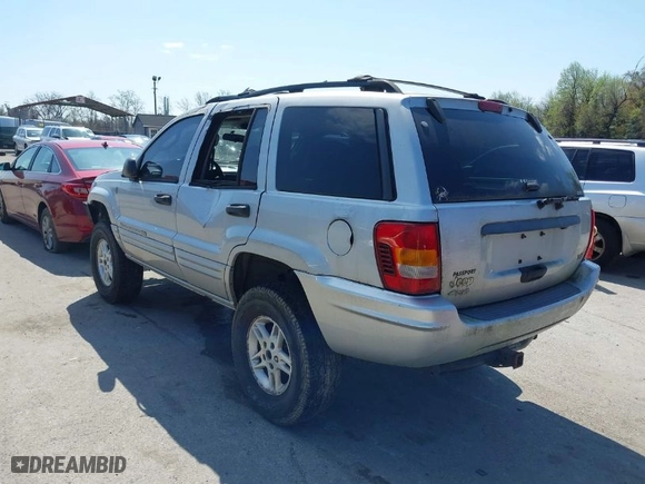 2004 Jeep Grand Cherokee Laredo with VIN 1J4GW48N74C372583, listed as a IAAI auction lot 41915693 with 154,273 mi miles. Bid and sale history available at carsss.com. Image 3.
