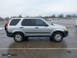 2005 Honda CR-V LX with VIN JHLRD68565C010541, listed as a IAAI auction lot 41660510 with 179,174 mi miles. Bid and sale history available at carsss.com. Image 13.