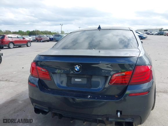2013 BMW M5 with VIN WBSFV9C59DD096774, listed as a IAAI auction lot 41608286 with 82,601 mi miles. Bid and sale history available at carsss.com. Image 16.