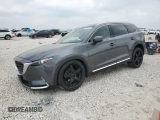 2019 Mazda CX-9 Grand Touring z VIN JM3TCADY9K0300284, wystawiony jako Copart lot #51801365 z przebiegiem 53 550 mil mil oraz Szkoda całkowita • Salvage title. Historia ofert i sprzedaży dostępna na DreamBid. Obrazek 1.