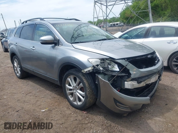 2011 Mazda CX-9 Grand Touring with VIN JM3TB3DV2B0332191, listed as a IAAI auction lot 42211435 with 155,801 mi miles and . Bid and sale history available at DreamBid. Image 1.