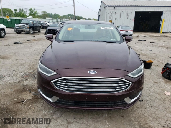 2018 Ford Fusion SE z VIN 3FA6P0HD2JR185298, wystawiony jako Copart lot #58898075 z przebiegiem Nie podano mil oraz Czysty tytuł • Clean title. Historia ofert i sprzedaży dostępna na DreamBid. Obrazek 5.