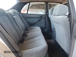1994 Toyota Camry LE z VIN JT2GK12E4R0005313, wystawiony jako Copart lot #58034555 z przebiegiem 182 221 mil mil oraz Szkoda całkowita • Salvage title. Historia ofert i sprzedaży dostępna na DreamBid. Obrazek 10.