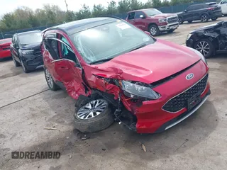 2022 Ford Escape Titanium Hybrid z VIN 1FMCU9DZ1NUA34474, wystawiony jako IAAI lot #42202510 z przebiegiem 17 229 mil mil oraz . Historia ofert i sprzedaży dostępna na DreamBid. Obrazek 1.