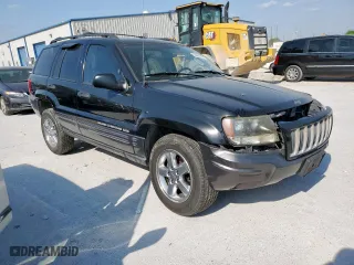 2004 Jeep Grand Cherokee Laredo with VIN 1J4GX48S24C303786, listed as a Copart auction lot 53482155 with 167,823 mi miles and Salvage Title. Bid and sale history available at carsss.com. Image 4.