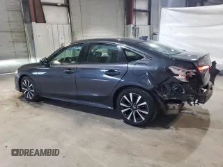2023 Honda Civic Sedan EX with VIN 2HGFE1F71PH313006, listed as a Copart auction lot 48667815 with 32,942 mi miles and Salvage Title. Bid and sale history available at carsss.com. Image 2.