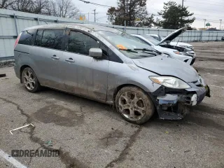 2010 Mazda 5 Sport with VIN JM1CR2W34A0387606, listed as a Copart auction lot 40808824 with Not Provided miles and Salvage Title. Bid and sale history available at DreamBid. Image 4.