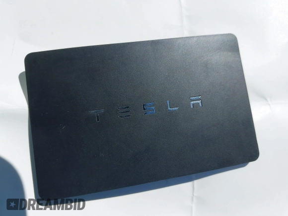 2019 Tesla Model 3 Mid Range with VIN 5YJ3E1EA0KF425079, listed as a IAAI auction lot 41871022 with 61,684 mi miles and . Bid and sale history available at DreamBid. Image 11.