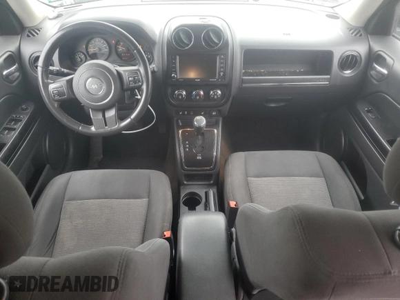 2016 Jeep Patriot Latitude with VIN 1C4NJRFB9GD586698, listed as a Copart auction lot 61131125 with 154,679 mi miles and Salvage title. Bid and sale history available at DreamBid. Image 8.