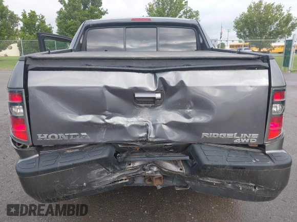 2014 Honda Ridgeline RTL with VIN 5FPYK1F5XEB011772, listed as a IAAI auction lot 42440390 with 145,219 mi miles and . Bid and sale history available at DreamBid. Image 6.