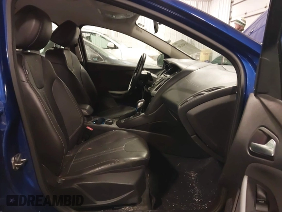 2013 Ford Focus SE z VIN 1FADP3F2XDL124732, wystawiony jako IAAI lot #41510140 z przebiegiem 69 819 mil mil oraz . Historia ofert i sprzedaży dostępna na DreamBid. Obrazek 5.