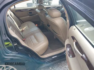 2001 Lincoln Town Car Signature with VIN 1LNHM82W11Y613959, listed as a IAAI auction lot 42432229 with 144,660 mi miles and . Bid and sale history available at DreamBid. Image 8.