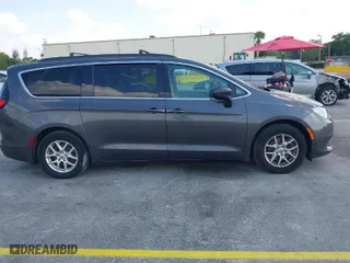 2021 Chrysler Voyager LXI with VIN 2C4RC1DG3MR565141, listed as a IAAI auction lot 42065933 with 134,138 mi miles. Bid and sale history available at carsss.com. Image 13.