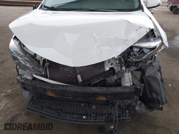 2019 Toyota Corolla L with VIN 5YFBURHE7KP862111, listed as a IAAI auction lot 42205368 with 96,823 mi miles and . Bid and sale history available at DreamBid. Image 6.