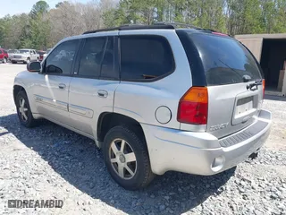 2005 GMC Envoy SLE with VIN 1GKDS13S652390259, listed as a IAAI auction lot 41825258 with 162,172 mi miles. Bid and sale history available at carsss.com. Image 3.