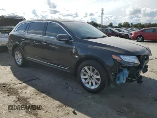 2015 Lincoln MKT with VIN 2LMHJ5NK2FBL04672, listed as a Copart auction lot 76257764 with 259,185 mi miles and Salvage Title. Bid and sale history available at carsss.com. Image 4.