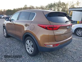 2019 Kia Sportage LX with VIN KNDPM3AC8K7598121, listed as a IAAI auction lot 41805939 with 119,050 mi miles and . Bid and sale history available at carsss.com. Image 3.