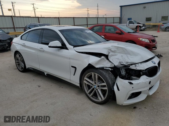 2018 BMW 4 Series 440i with VIN WBA4J5C51JBF06736, listed as a Copart auction lot 64165524 with 65,066 mi miles and Salvage Title. Bid and sale history available at DreamBid. Image 4.