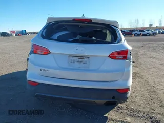 2013 Hyundai Santa Fe Sport z VIN 5XYZT3LB2DG021803, wystawiony jako IAAI lot #41195838 z przebiegiem Nie podano mil oraz . Historia ofert i sprzedaży dostępna na DreamBid. Obrazek 16.