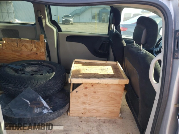 2014 Dodge Grand Caravan American Value with VIN 2C4RDGBG5ER185593, listed as a Copart auction lot 48768065 with 167,834 mi miles and Salvage Title. Bid and sale history available at DreamBid. Image 10.
