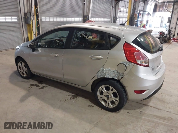 2016 Ford Fiesta SE with VIN 3FADP4EJ9GM197205, listed as a IAAI auction lot 41815313 with 115,689 mi miles. Bid and sale history available at carsss.com. Image 3.
