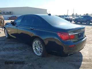 2015 BMW 7 Series 750Li xDrive with VIN WBAYF8C59FD655120, listed as a IAAI auction lot 41315152 with 82,244 mi miles and . Bid and sale history available at carsss.com. Image 3.