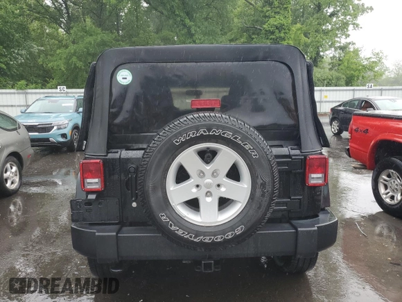 2017 Jeep Wrangler Unlimited Sport with VIN 1C4BJWDG8HL707809, listed as a Copart auction lot 57096085 with 34,959 mi miles and Salvage title. Bid and sale history available at DreamBid. Image 6.