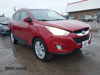 2013 Hyundai Tucson GLS with VIN KM8JU3AC8DU683546, listed as a IAAI auction lot 41956167 with 141,510 mi miles. Bid and sale history available at carsss.com. Image 1.