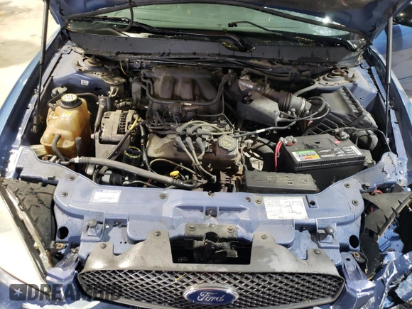 2004 Ford Taurus SE z VIN 1FAFP532X4A187754, wystawiony jako Copart lot #51262185 z przebiegiem 121 663 mil mil oraz Szkoda całkowita • Salvage title. Historia ofert i sprzedaży dostępna na DreamBid. Obrazek 11.