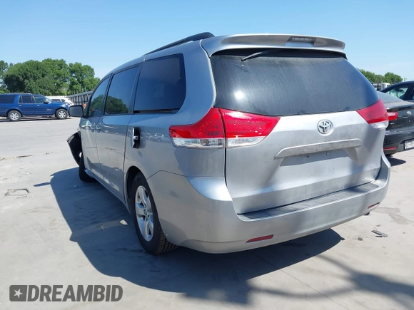 2014 Toyota Sienna LE AAS with VIN 5TDKK3DC4ES447265, listed as a IAAI auction lot 42024631 with 112,890 mi miles and . Bid and sale history available at carsss.com. Image 3.