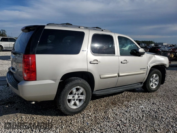 2009 GMC Yukon SLT w/4SA with VIN 1GKFC33J99R148006, listed as a Copart auction lot 88668535 with 145,088 mi miles and Salvage Title. Bid and sale history available at carsss.com. Image 3.