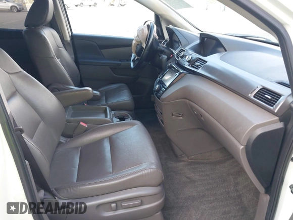 2015 Honda Odyssey Touring Elite with VIN 5FNRL5H9XFB102222, listed as a IAAI auction lot 42485059 with 123,562 mi miles and . Bid and sale history available at DreamBid. Image 5.