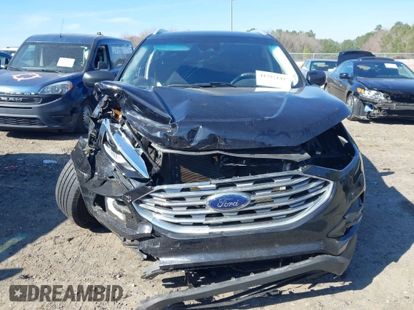 2020 Ford Edge SE z VIN 2FMPK3G97LBA92060, wystawiony jako IAAI lot #41791142 z przebiegiem 59 578 mil mil oraz . Historia ofert i sprzedaży dostępna na DreamBid. Obrazek 13.