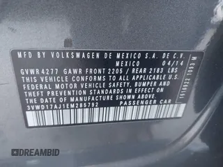 2014 Volkswagen Jetta SE z VIN 3VWD17AJ1EM285792, wystawiony jako IAAI lot #41652684 z przebiegiem 169 929 mil mil oraz . Historia ofert i sprzedaży dostępna na DreamBid. Obrazek 9.