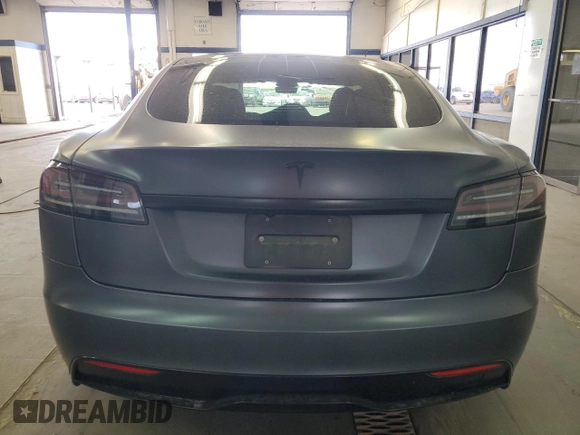 2022 Tesla Model S с VIN 5YJSA1E5XNF488415, выставлен на аукционе Copart как лот 57347565 с пробегом 18 662 миль миль и Списание • Salvage title. История ставок и продаж доступна на DreamBid. Изображение 6.