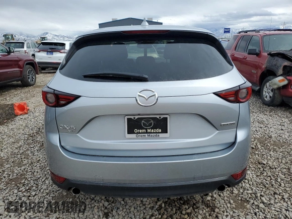 2021 Mazda CX-5 Grand Touring with VIN JM3KFBDM1M1403699, listed as a Copart auction lot 49888655 with 29,919 mi miles and Salvage Title. Bid and sale history available at carsss.com. Image 6.