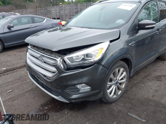 2018 Ford Escape Titanium с VIN 1FMCU9J93JUB18374, выставлен на аукционе IAAI как лот 42652204 с пробегом 63 609 миль миль и . История ставок и продаж доступна на DreamBid. Изображение 6.
