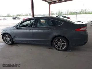2016 Ford Fusion Energi Titanium with VIN 3FA6P0SU9GR103245, listed as a IAAI auction lot 41888435 with 123,975 mi miles. Bid and sale history available at carsss.com. Image 14.