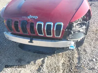 2016 Jeep Cherokee Latitude with VIN 1C4PJMCB2GW153972, listed as a IAAI auction lot 40579489 with 130,176 mi miles. Bid and sale history available at carsss.com. Image 6.